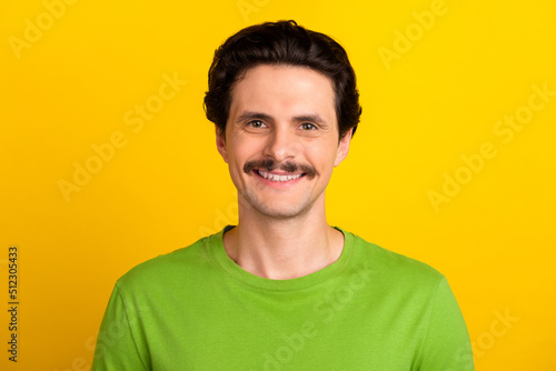 Portrait of satisfied glad young person toothy beaming smile look camera isolated on yellow color background