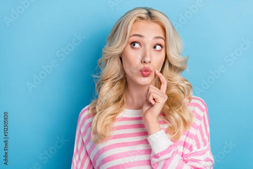 Photo of cute millennial blond hairdo lady look promo wear striped shirt isolated on blue color background