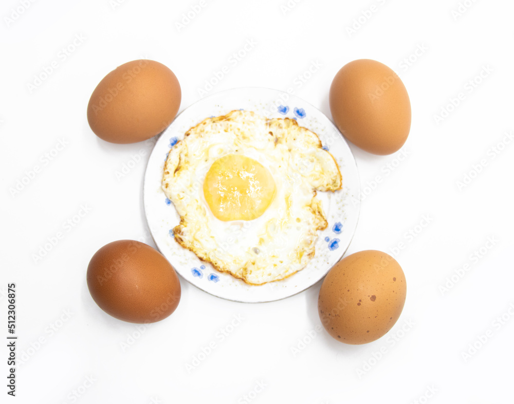 whole eggs and fried egg isolated on white background on top view food cooking photo object design whole eggs and fried egg isolated on white background on top view food cooking photo object design