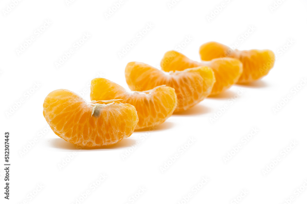 some slices of tangerine isolated on white background. some slices of tangerine isolated on white background.