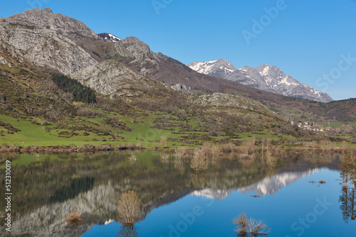 Beautiful reservoir and mountain landscape in Riano. Mirror effect. Spain © h368k742