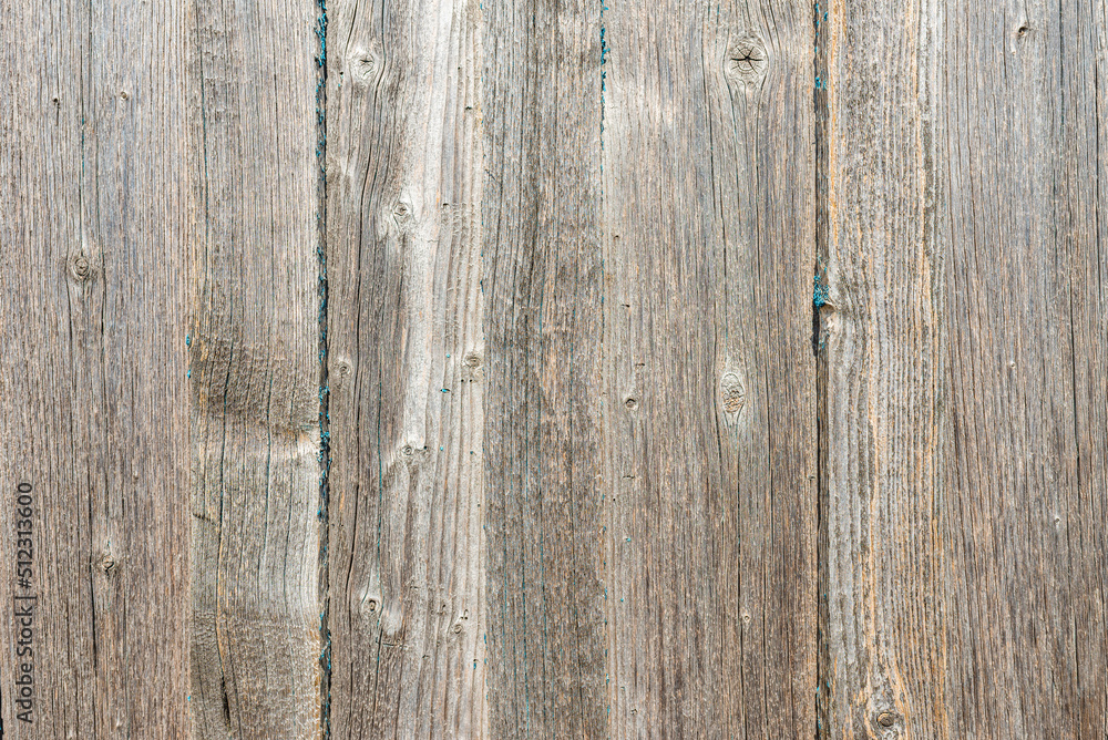 background old gray wooden boards close up.Boards are vertical.Outdoors shot. background old gray wooden boards close up.Boards are vertical.Outdoors shot.