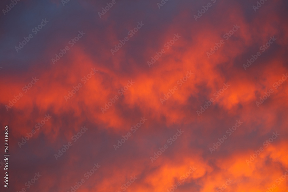 Red and purple clouds in the sky at sunset