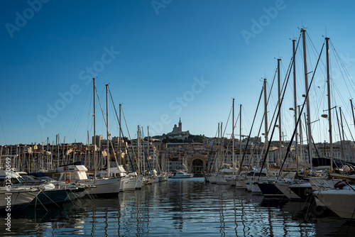 Fototapeta Naklejka Na Ścianę i Meble -  France. Bouche-du-Rhone (13) Marseille. The old port of Marseille in the background the Basilica of Notre Dame de la Garde