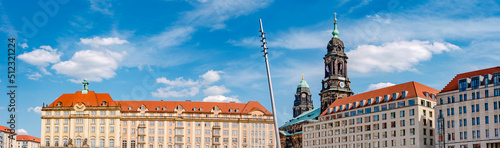 Herbstmarkt and Holy Cross Church bell and clock tower. Panoramic cityscape of beautiful modern Dresden. Historical, touristic and shopping center in downtown of Dresden. photo
