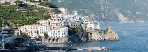 Stunning view of the village of Amalfi during a sunny day. Amalfi is a city and comune on the Amalfi Coast in the province of Salerno in the Campania region of south Italy.