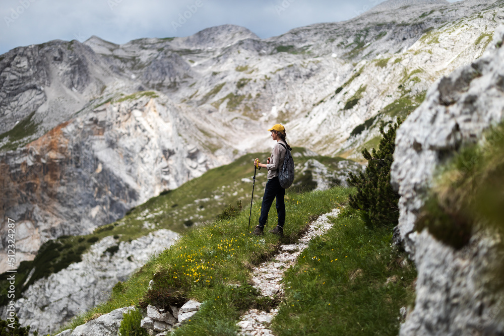 Female Hiker Admiring Alpine View From a Hiking Trail in Julian Alps