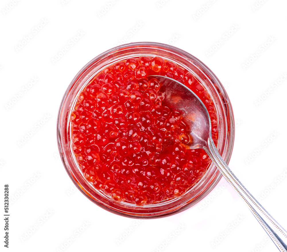 Glass jar with red caviar and metal spoon isolated on white background. Glass jar with red caviar and metal spoon isolated on white background.