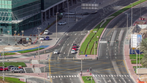 Photography Bussy traffic on the road intersection in Dubai business bay district aerial tim