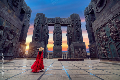 Tourist girl visiting at Chronicle of Georgia in Tbilisi, Georgia.