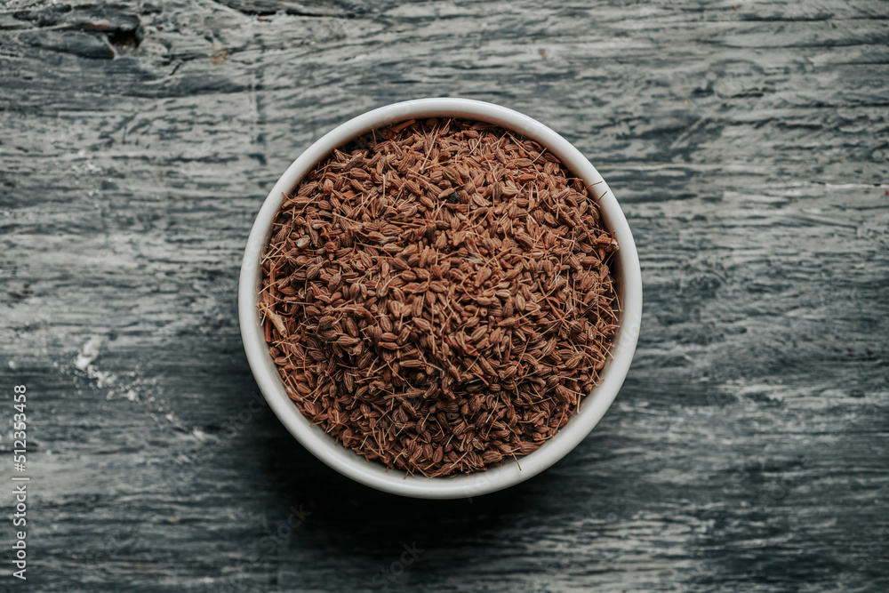 ceramic bowl full of dry anise seeds ceramic bowl full of dry anise seeds