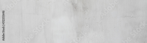 Panoramic grunge wall background. Soft grey plaster texture