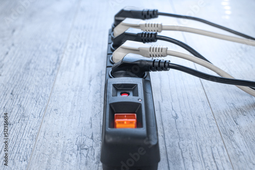 The power plugs and a one multi socket electrical splitter with the surge protection.