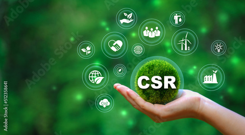 Corporate and community social responsibility give back CSR icon concept on green nature background. photo