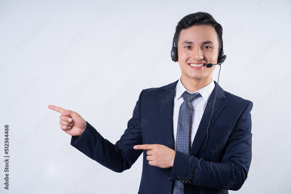 Image of young Asian businessman on background Image of young Asian businessman on background