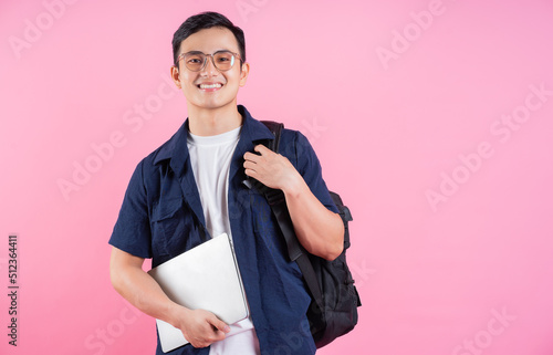Foto Image of young Asian college student on pink background