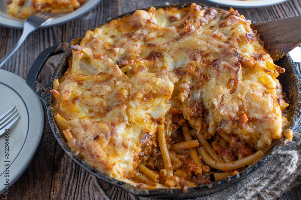 Macaroni casserole with mozzarella cheese topping. Cooked with bolognese and bechamel sauce Macaroni casserole with mozzarella cheese topping. Cooked with bolognese and bechamel sauce