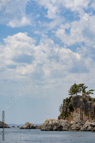 Beautiful summer Mediterranean coast with large sea stones