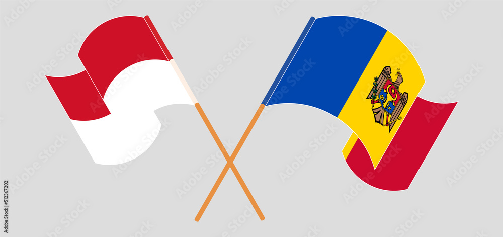 Crossed and waving flags of Indonesia and Moldova Crossed and waving flags of Indonesia and Moldova