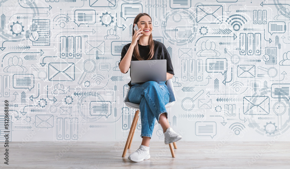 Fototapeta premium Remote Work. Woman Using Laptop And Talking On Cellphone Over Media Icons
