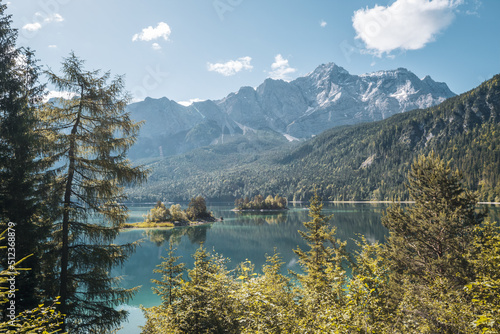 The Eibsee lake and the Zugspitze Mountain in Garmisch-Partenkirchen, Germany photo