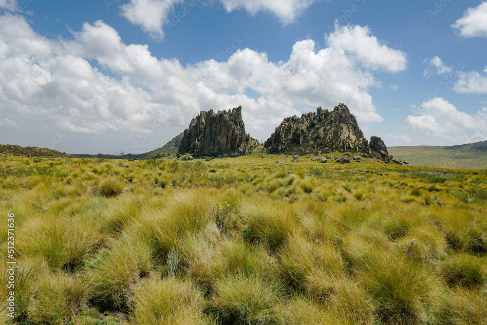Scenic view of rock formations against a mountain background at Ol Doinyo Lesatima Dragons Teeth in the Aberdares, Kenya