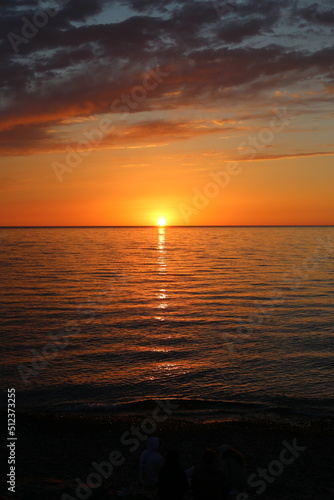 View of beautiful sunset at the sea. © Maria Kasimova