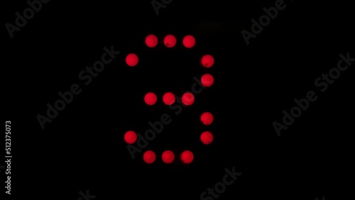 Digital numbers of elevators from 1 to 10, red color on black.