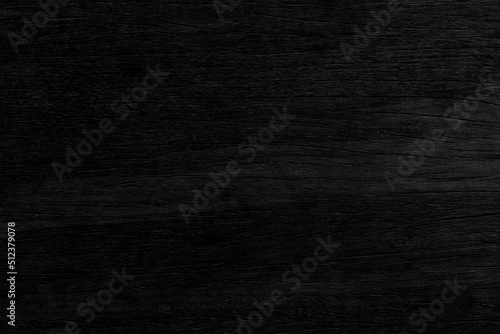 Black wooden wall painted texture for background.