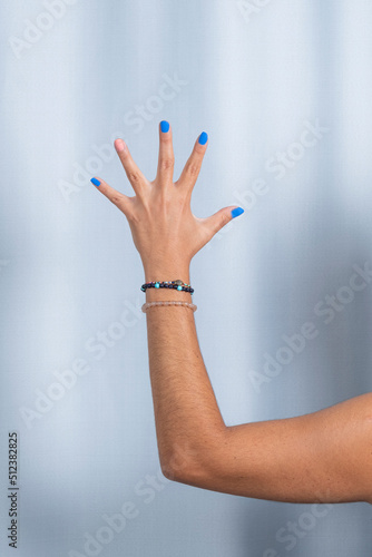 Female hand and fingers gesture.