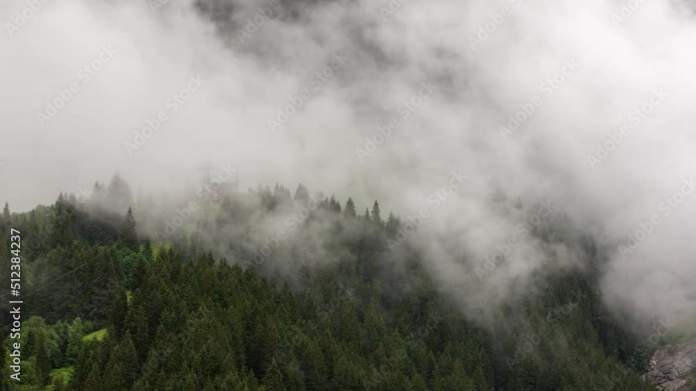 Timelapse of low clouds at pfingstegg in Grindelwald in Swiss Alps Timelapse of low clouds at pfingstegg in Grindelwald in Swiss Alps