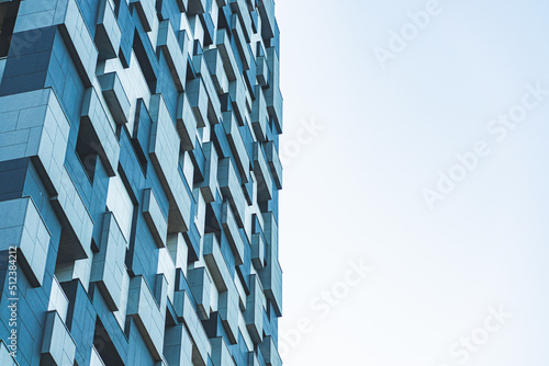 underside panoramic and perspective view to steel blue glass high rise building skyscrapers, business concept of successful industrial architecture