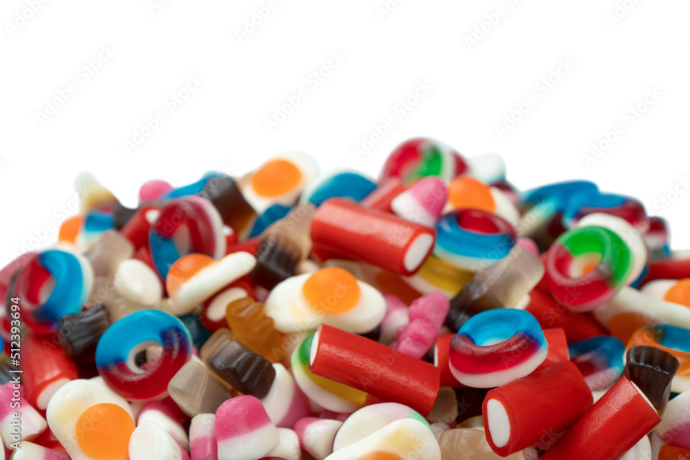 Tasty mix of jelly colorful candies isolated on a white background. Tasty mix of jelly colorful candies isolated on a white background.