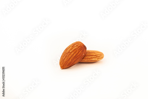 Close-up of natural big raw peeled almonds nuts as a background