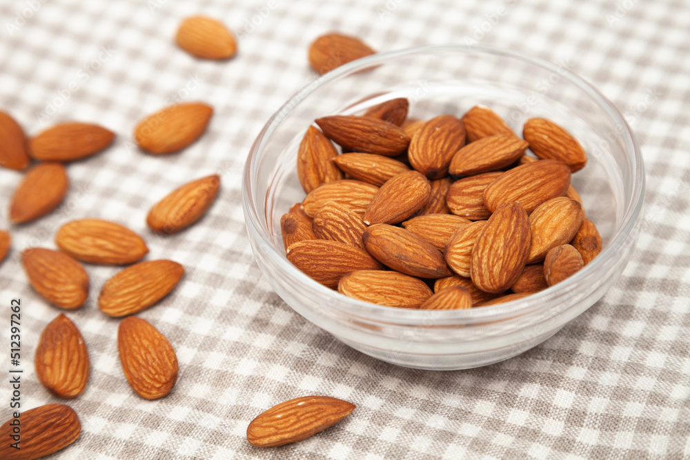 Close-up of natural big raw peeled almonds nuts as a background Close-up of natural big raw peeled almonds nuts as a background