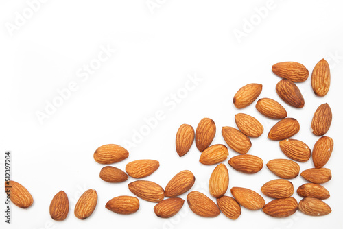 Close-up of natural big raw peeled almonds nuts as a background