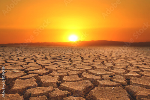 Global warming  drought  lack of rain  no seasonality The land is cracked. concept of environment change and global warming