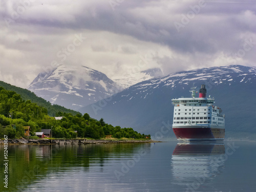 Photo manipulation of a big cruise ship in a fjord in Norway. Atlantic ocean 