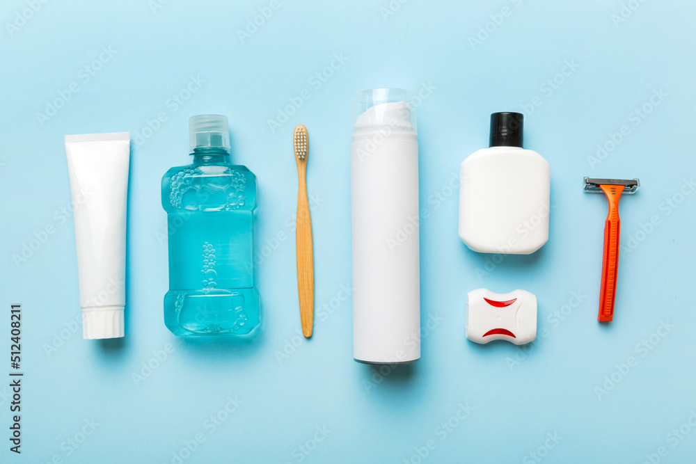 Mockup for bathing products top view flat lay, spa razor, toothpaste, soap, gel and other various accessories. Cosmetics for skin health. Bath Mockup for your logo - obrazy, fototapety, plakaty 