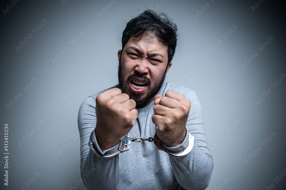 Asian handsome man angry on white background,Portrait of young Stress male concept,Bad mood after talking on the phone