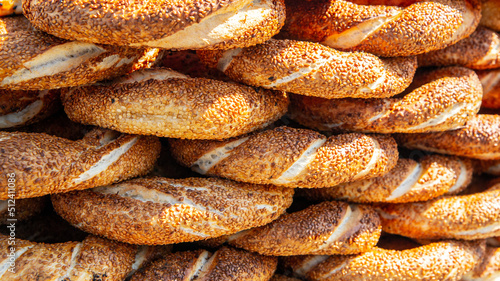 Closeup view of simit (circular bread), a popular street food among tourists and residents in Turkey. © Elena