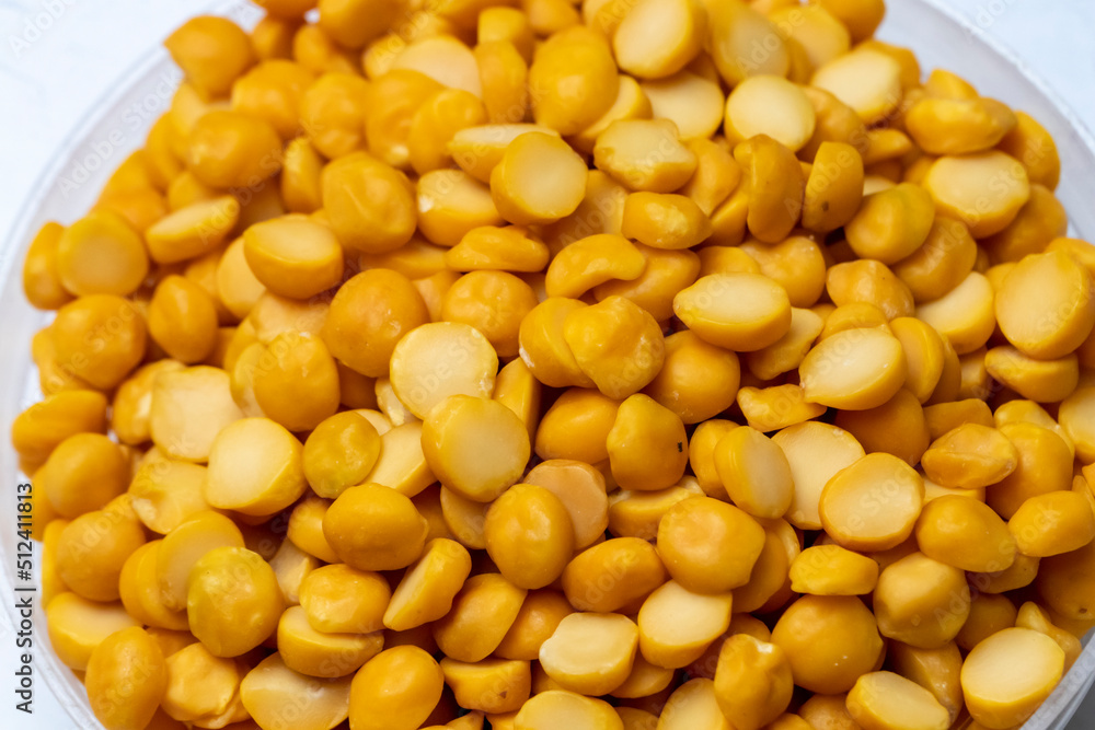 Toor Dal close-up photo With White Background Toor Dal close-up photo With White Background