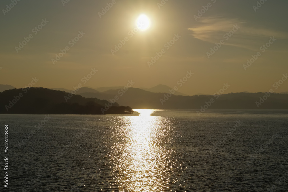 Sunset view with mountain and reflection on lake water