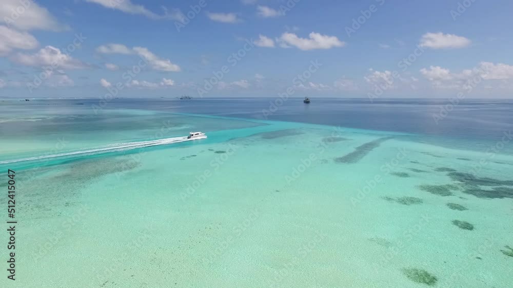 Drone flying after a boat in the Indian ocean Maldives Full HD Drone flying after a boat in the Indian ocean Maldives Full HD