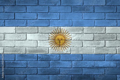 Argentina flag painted on a brick wall. Flaga Argentyny namalowana na ścianie z cegły.