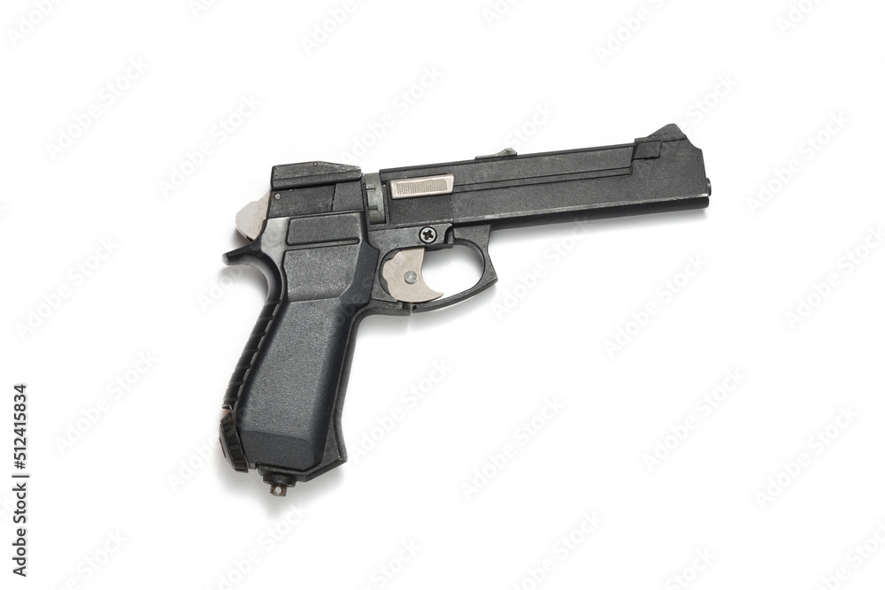 Black gas gun on a white background in close-up. Air gun pneumatic weapon Black gas gun on a white background in close-up. Air gun pneumatic weapon