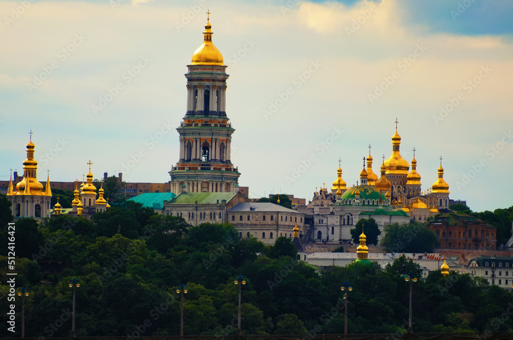 Panoramic landscape view of ancient Kyiv Pechersk Lavra. Sky with white clouds in the background. Christian Orthodox monastery. UNESCO World Heritage Site