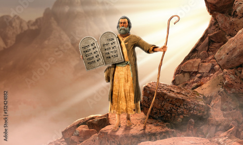 Photo Moses holding 10 Commandments tablets coming down  mount Sinai