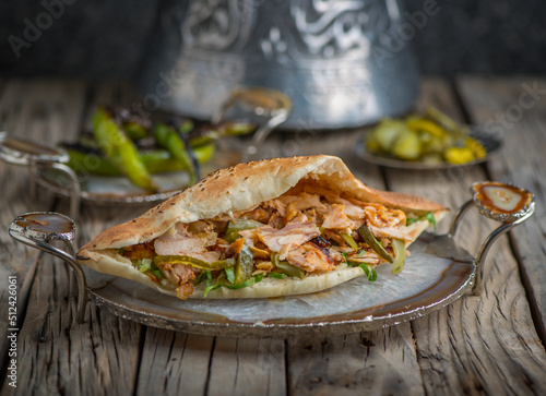 Konstfotografi iraqi arabic shawarma served in dish side view on wooden table background