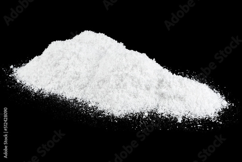 White snow at night. Pile of white snow isolated on a black background.